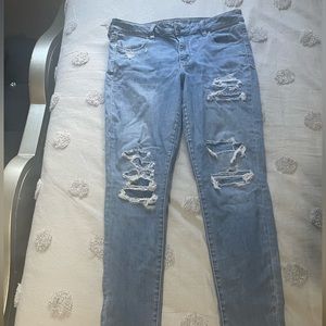 American Eagle Woman Super Stretch X Hi Rise Patched Jeans